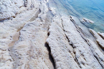 Dead Sea in Jordan, it is famous for its saturated salty waters; the water is so salty that no marine life can survive in this sea