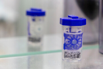 Eye lens equipment: container, eye drops, lenses and liquid