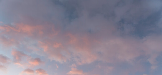 Fototapeta na wymiar Beautiful sunrise sky with orange clouds. Sky background.