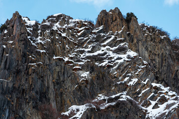 Fototapeta na wymiar Beautiful winter mountains landscape. High snow covered rocks.