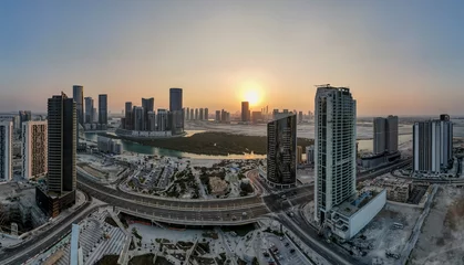 Gartenposter Aerial view on Al Reem island in Abu Dhabi at sunset © Freelancer