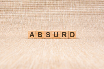 word absurd made with wood building blocks, stock image