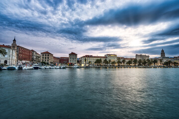 Riva promenade with Diocletian Palace at dawn. Split, Croatia