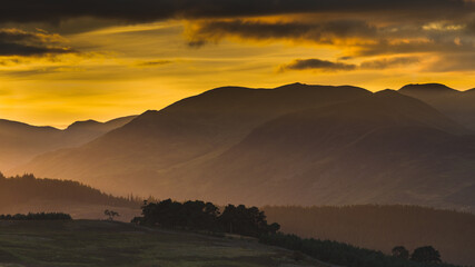 A colorful sunset in the Highlands of Scotland. © Jaroslaw