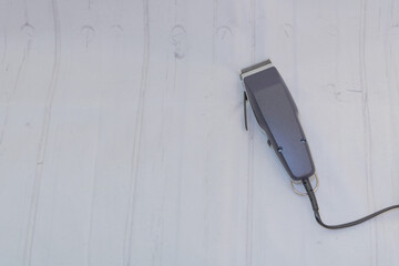 Closeup shot of a hair clipper on the white background