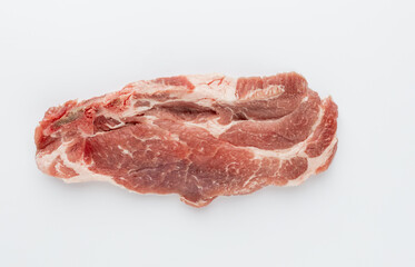 Piece of pork meat isolated on white background.