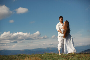 Couple walk in the mountains