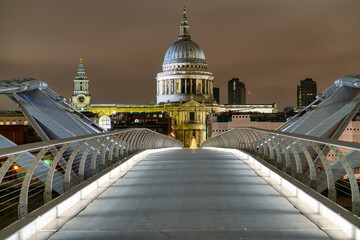 Millennium bridge and dome of St. Paul's Cathedral in London