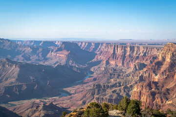 The Colorado River cuts through the massive Grand Canyon 