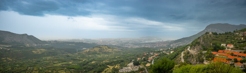 Fototapeta premium Landscape panorama of Dalmatia with Split city in the background. Croatia