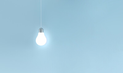 Glowing light bulbs in a row on blue background. Horizontal composition with copy space. Creativity...