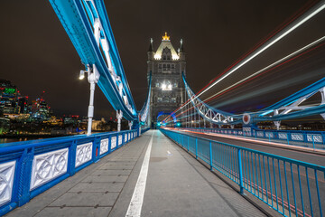 Obraz premium Tower Bridge with evening traffic lights in London. England 