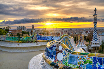 Beautiful sunrise skyline of Barcelona seen from Park Guell which was built  in 1926
