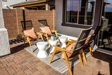 Conversation Area With Four High Back Chairs On Rear Patio