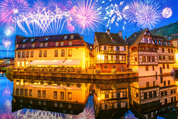 Fireworks at the old town water canal panorama of Strasbourg, Alsace, France. Traditional half...
