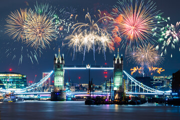 Tower Bridge with fireworks display in London.  England