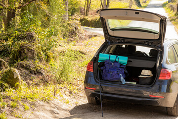car trunk with travel and excursion luggage