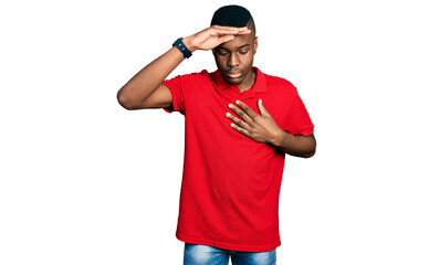 Young african american man wearing casual red t shirt touching forehead for illness and fever, flu and cold, virus sick