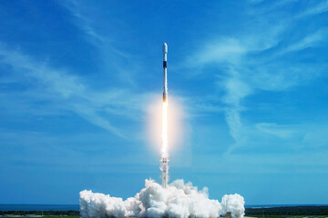 Take off space rocket on a background of blue sky and sun. Elements of this image were furnished by NASA