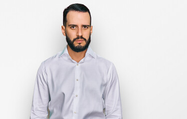 Young man with beard wearing business shirt skeptic and nervous, frowning upset because of problem....