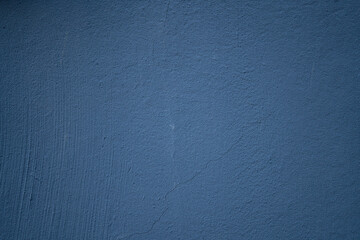 beautiful textured background in the form of a blue wall