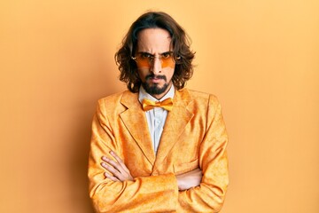 Fototapeta premium Young hispanic man wearing hipster elegant look skeptic and nervous, disapproving expression on face with crossed arms. negative person.