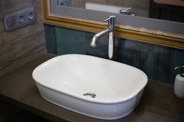 Fototapeta premium Washbasin with a sink in a modern bathroom