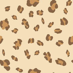 Seamless pattern with hand drawn leopard spots. Cute doodle illustration on a beige background. Vector background leopard spots.