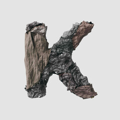 Stone letter K on light background isolated metall rusty thrash foil white background