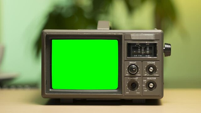 80s 90s Retro Vintage TV With Static and Green Screen Closeup