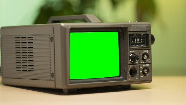 Vintage 80s 90s Portable Television With Static and Green Screen