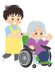 介護士の男性と車椅子の高齢女性