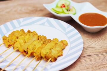 Pork satay,Grilled pork served with peanut sauce or sweet and sour sauce, Thai Street food.