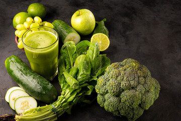 Healthy detox smoothie with cucumber, broccoli, green apple, kale and green grapes. Detox drink.