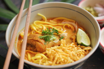 Khao Soi Recipe,Khao Soi,Khao Soi Kai, Thai Noodles Khao Soi, Chicken Curry with seasoning served on wooden table
