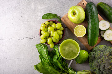 Healthy detox smoothie with cucumber, broccoli, green apple, kale and green grapes. Detox drink.