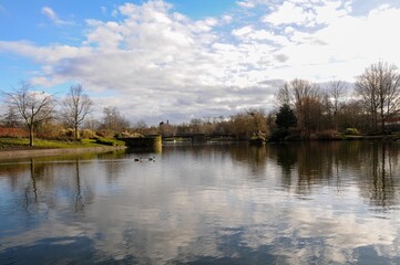 Mirror reflection of clouds in the lake