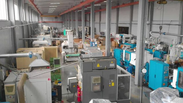Industrial interior of a modern factory. Production workshop general plan. Span in a large workshop with machine tools.