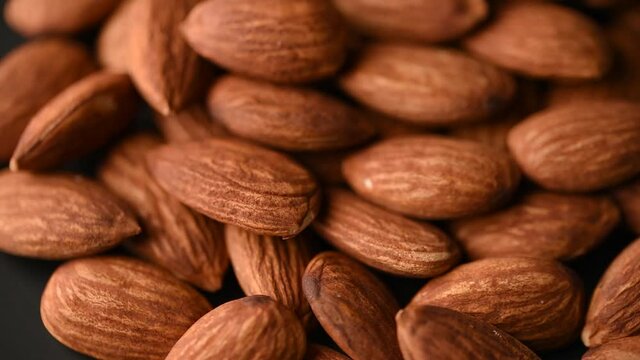almond rotate on black background