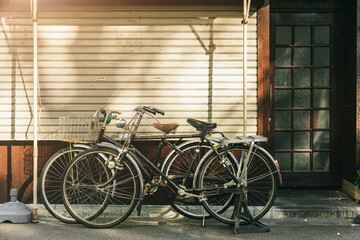 Fototapeta na wymiar vintage bicycle parking at the street in Japan