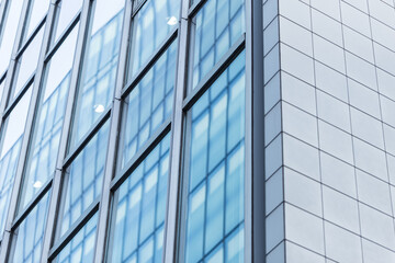 Fototapeta na wymiar busiess financial office building skyscrapers glass windows in the modern city