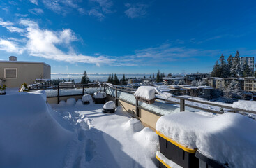 Rooftop patio at Univercity Highlands, BC, after heavy snow.