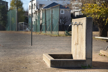 Drinking fountain in the public playground
