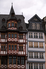Fototapeta na wymiar Old houses in Germany, photographed in the city center of Frankfurt. Timbered houses architecture.