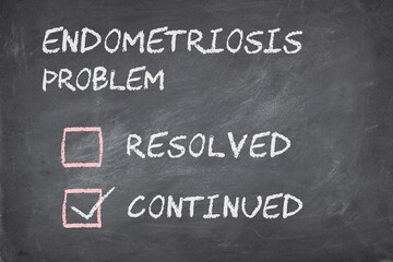Fototapeta premium Women's health issues concept. Endometriosis problem continued selected in check boxes. Blackboard background. 