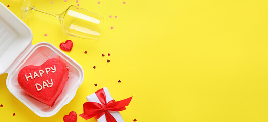 Tasty bento cake and gift for Valentine's Day on yellow background with space for text