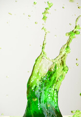 Green water splash with droplets on white background. 3d illustration.