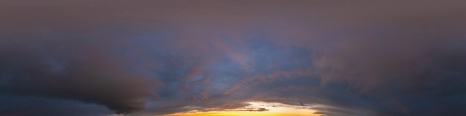Dramatic sunset sky panorama with Cumulus clouds. Seamless hdr 360 pano in spherical equirectangular format. Complete zenith for 3D visualization, game and sky replacement for aerial drone panoramas