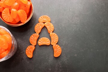 Orange sugar candy. Indian Vintage style boiled sugar confectionery Orange flavored candy or...