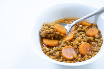 Spanish lentil stew dish with copy space